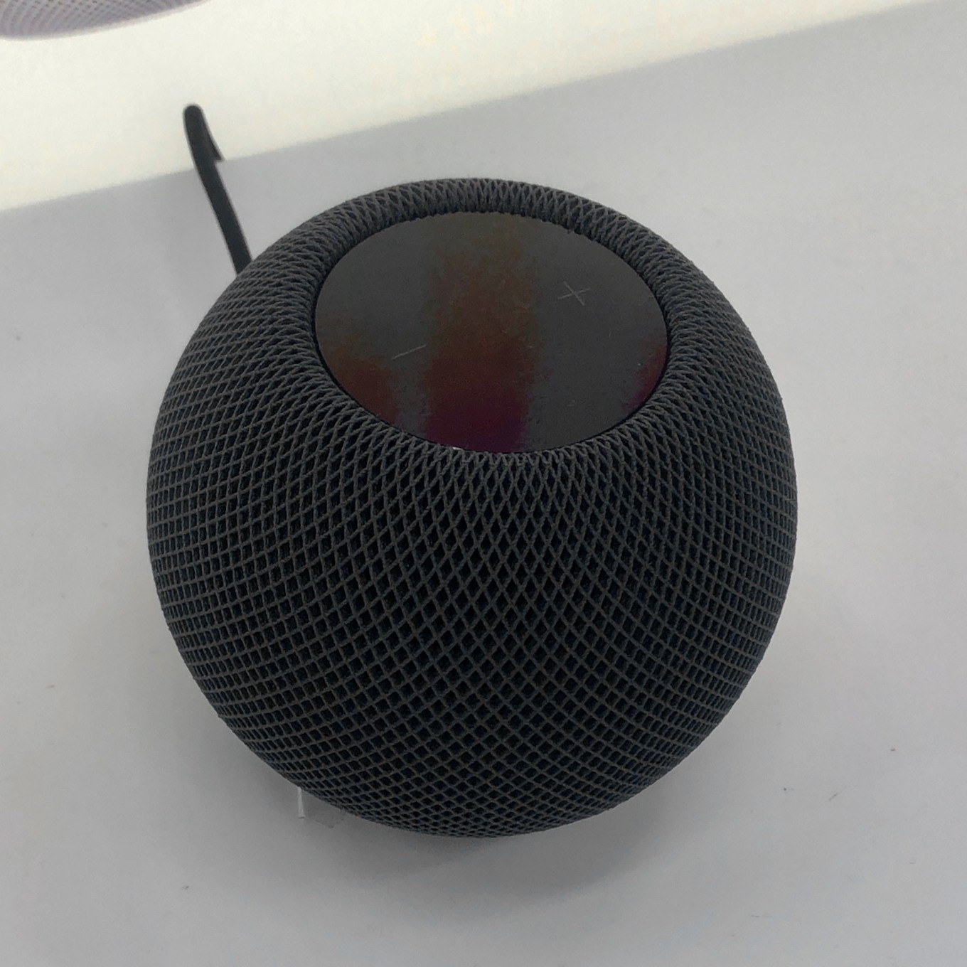 HomePod mini in Space Gray, top controls